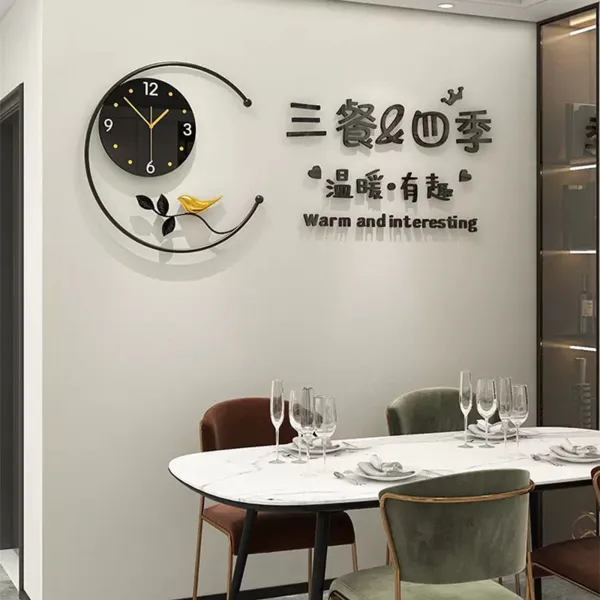 Modern Black and Gold Wall Clock with Bird Design