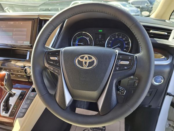 2015 Toyota Alphard Hybrid.Cruise control.Rear cam.Park sensors.Elec doors.8 SRS Airbags Carousel 9
