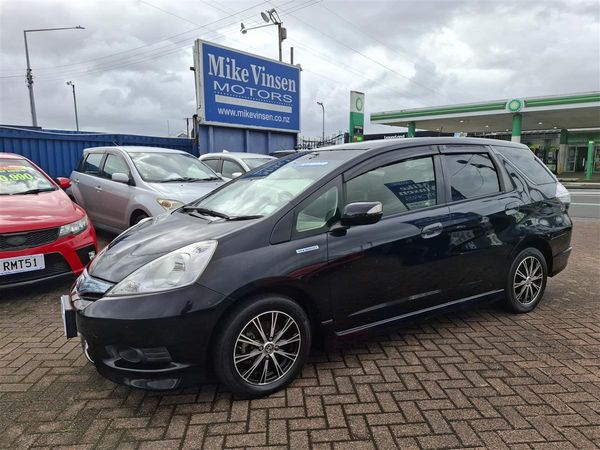 2013 Honda Fit SHUTTLE HYBRID CRUISE CONTROL HALF LEATHER SEATS ECO MODE Carousel 2