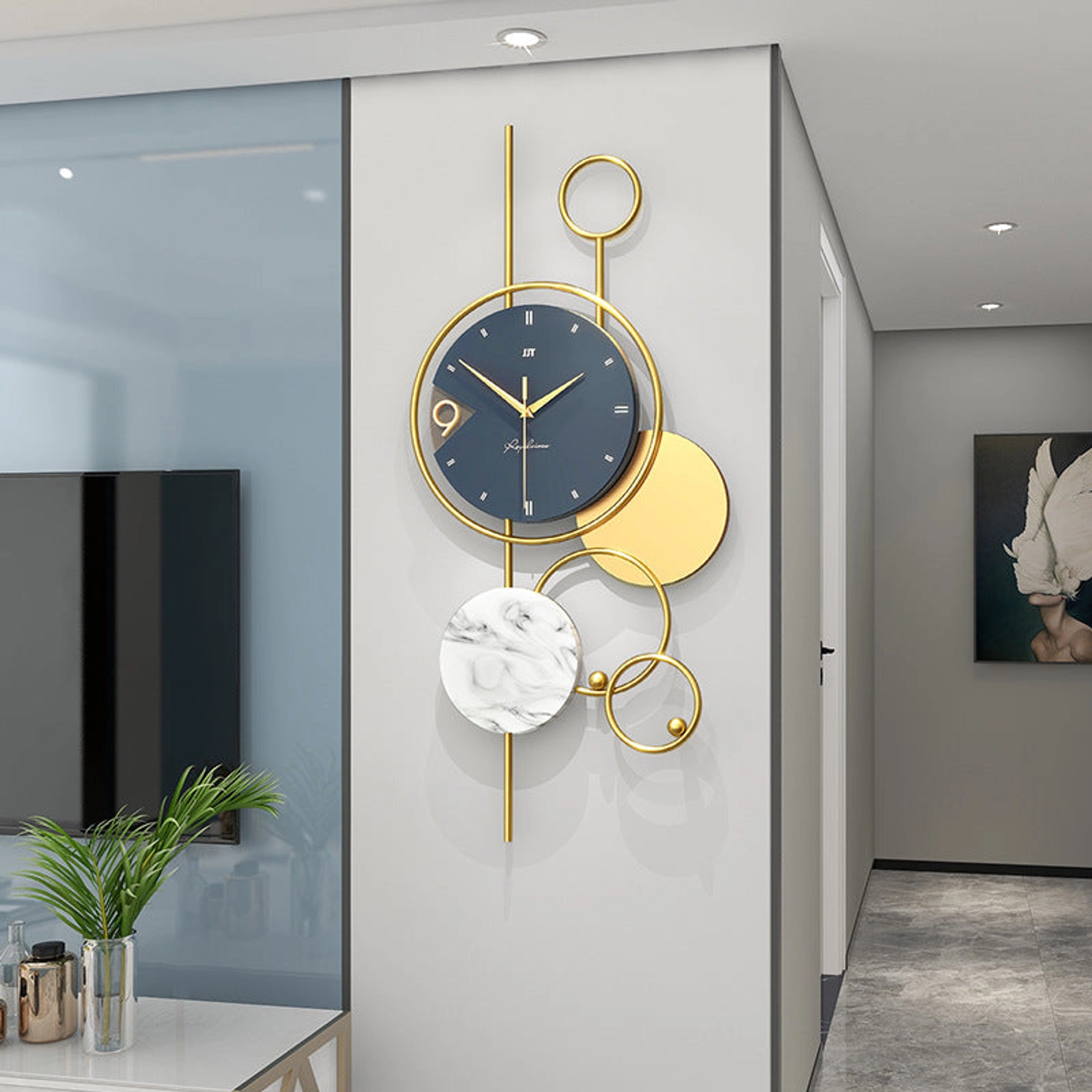 Modern Wall Clock with Gold Accents and Marble Disc Carousel 2