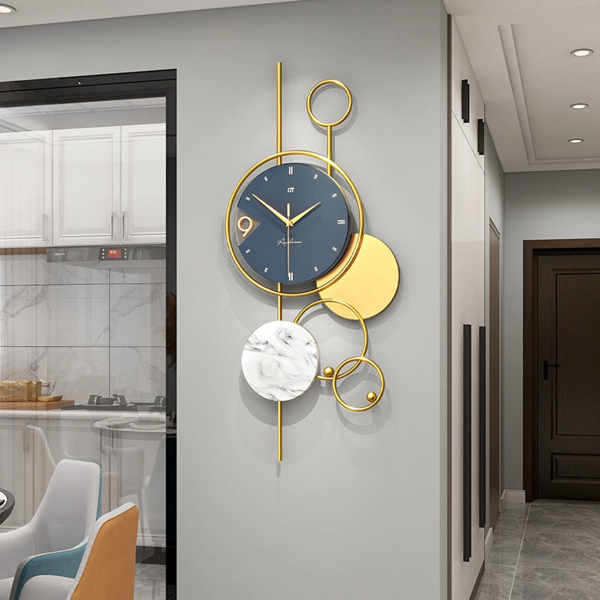 Modern Wall Clock with Gold Accents and Marble Disc Carousel 3