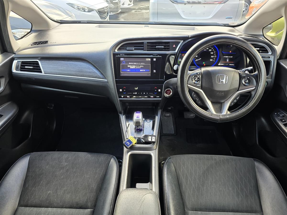 2015 Honda Shuttle **Z Sensing****Hybrid**Cruise Control**Heating & Half Leather Seats**Push Start**Factory Alloys**Reversing Camera** Carousel 1