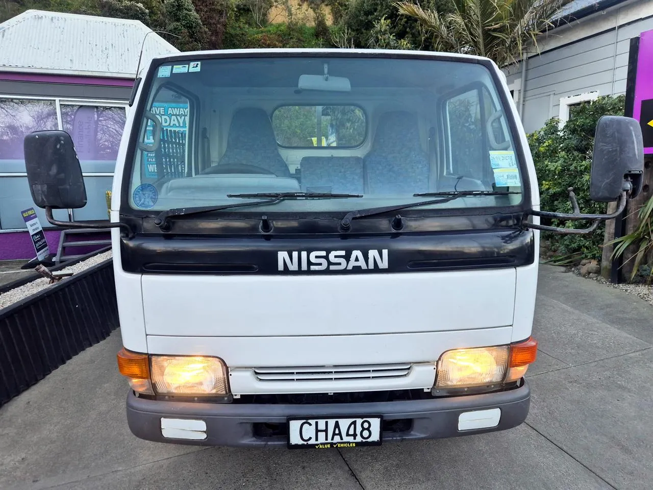 1997 Nissan Atlas 2.5D - Flatdeck - 3seater Carousel 1