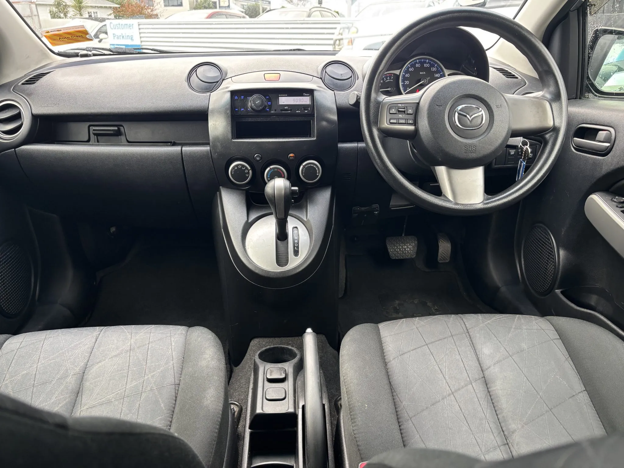 second hand 2014 Mazda Demio for sale NZ Collage 1