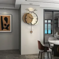 Stylish Modern Wall Clock with Antler Design and Pendulum Carousel 3