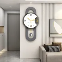 Minimalist Gray Wall Clock with Gold Pendulum and Charcoal Frame