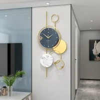 Modern Wall Clock with Gold Accents and Marble Disc
